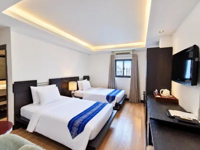Executive tweelingkamer — A&EM - The Petit Hotel
